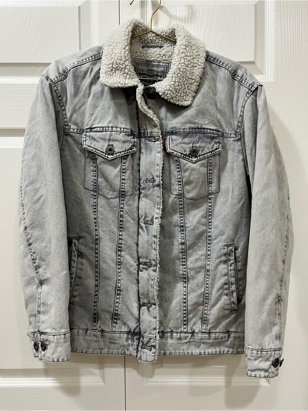 Levi's gray denim sherpa trucker jacket, size small.